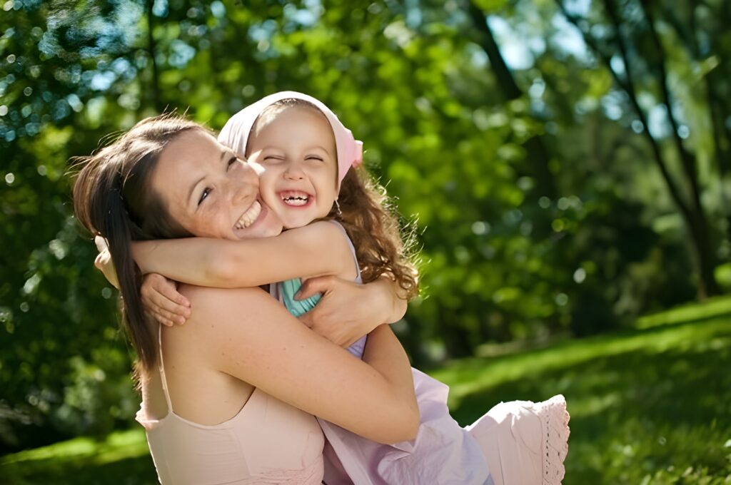 A genuine moment between mom and child - laughing together, hugging, or playing - authentic connection